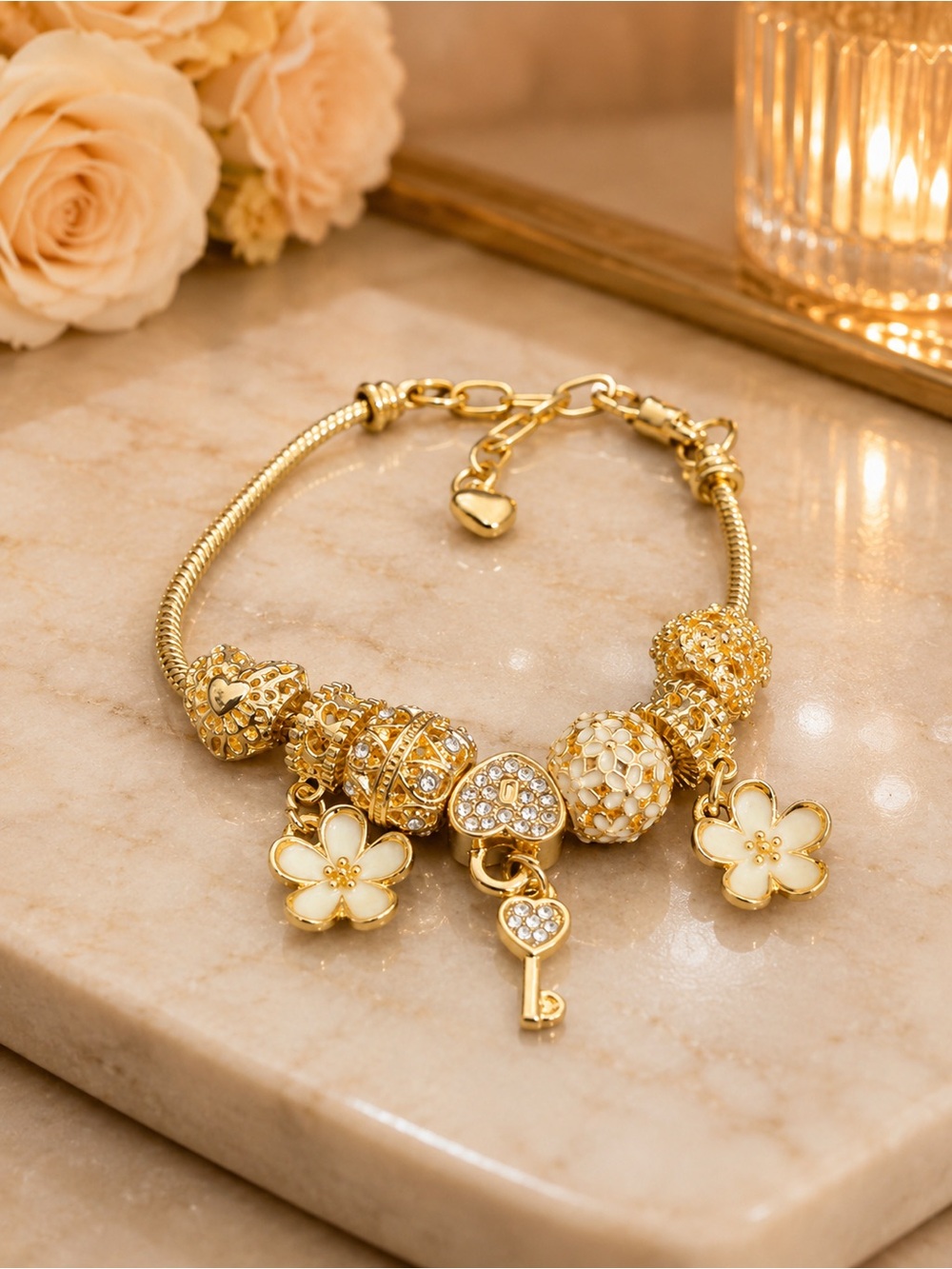Gold Floral Charm Bracelet with Key Pendant
